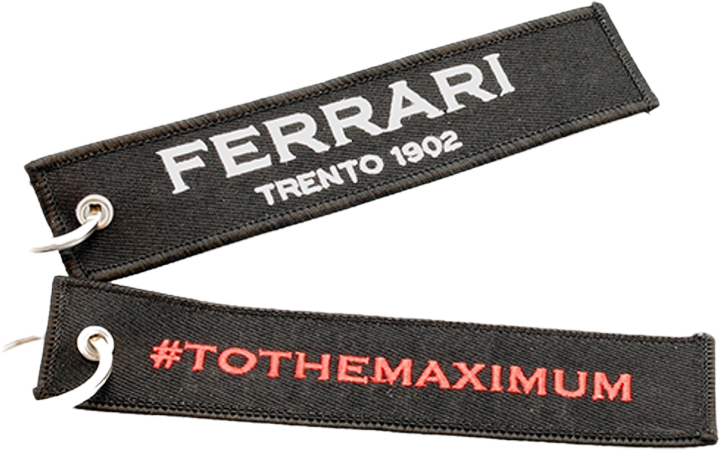 Ferrari keyring hanging next to wine bottle neck