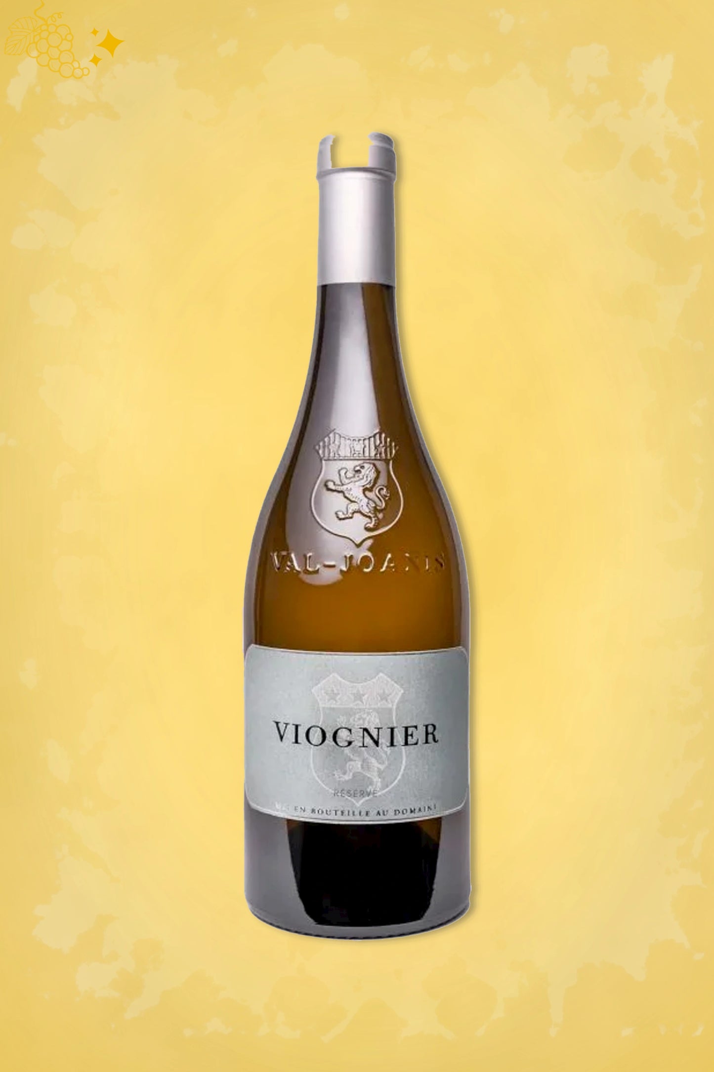 Fles Val Joanis Viognier Réserve 2025 uit de Luberon met goudkleurig etiket tegen gouden achtergrond.