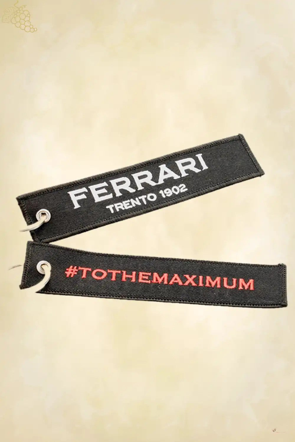 Ferrari #Tothemaximum keychain close-up on carbon fibre