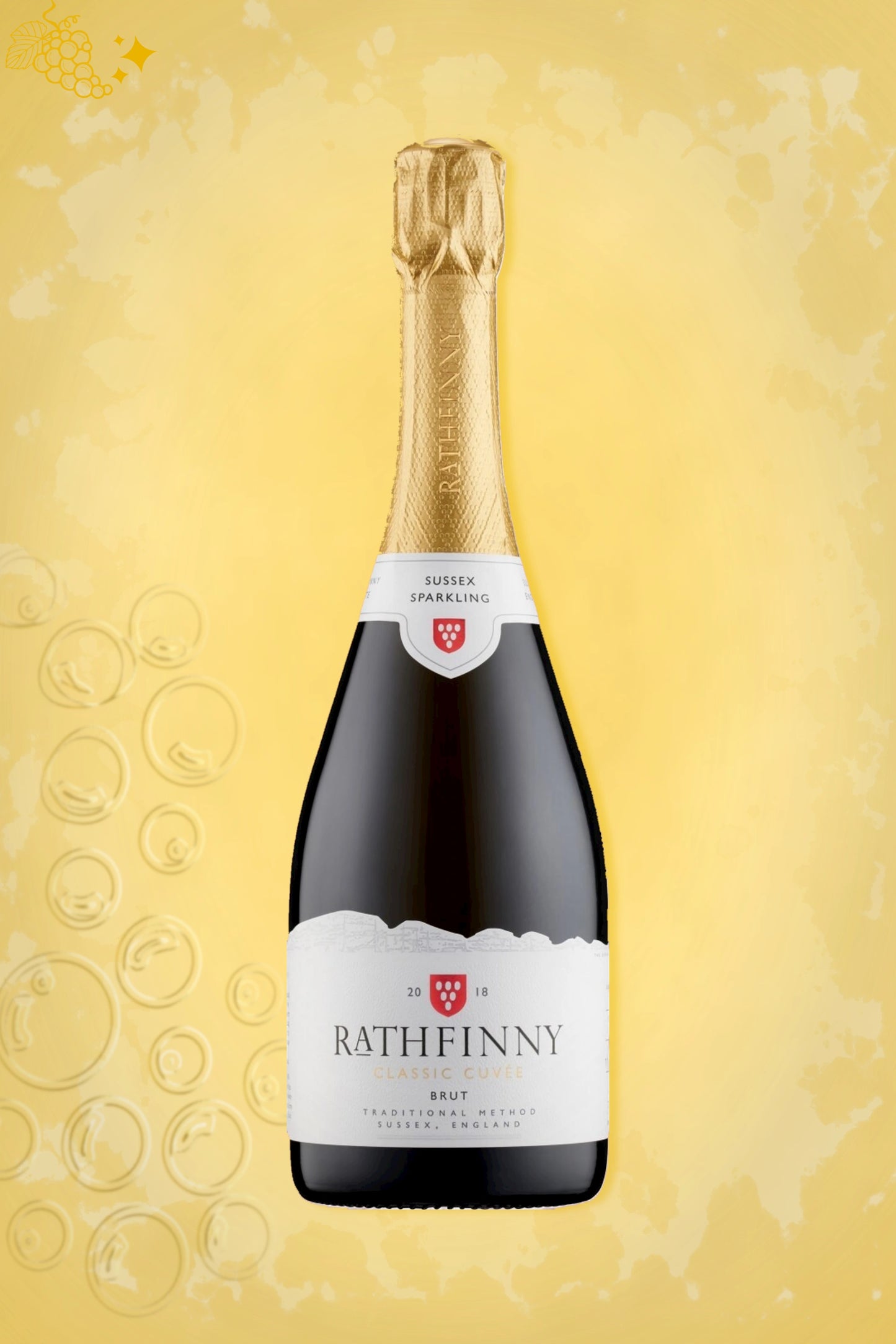 Rathfinny Classic Cuvée 2019 tegen gouden achtergrond – elegante mousserende wijn